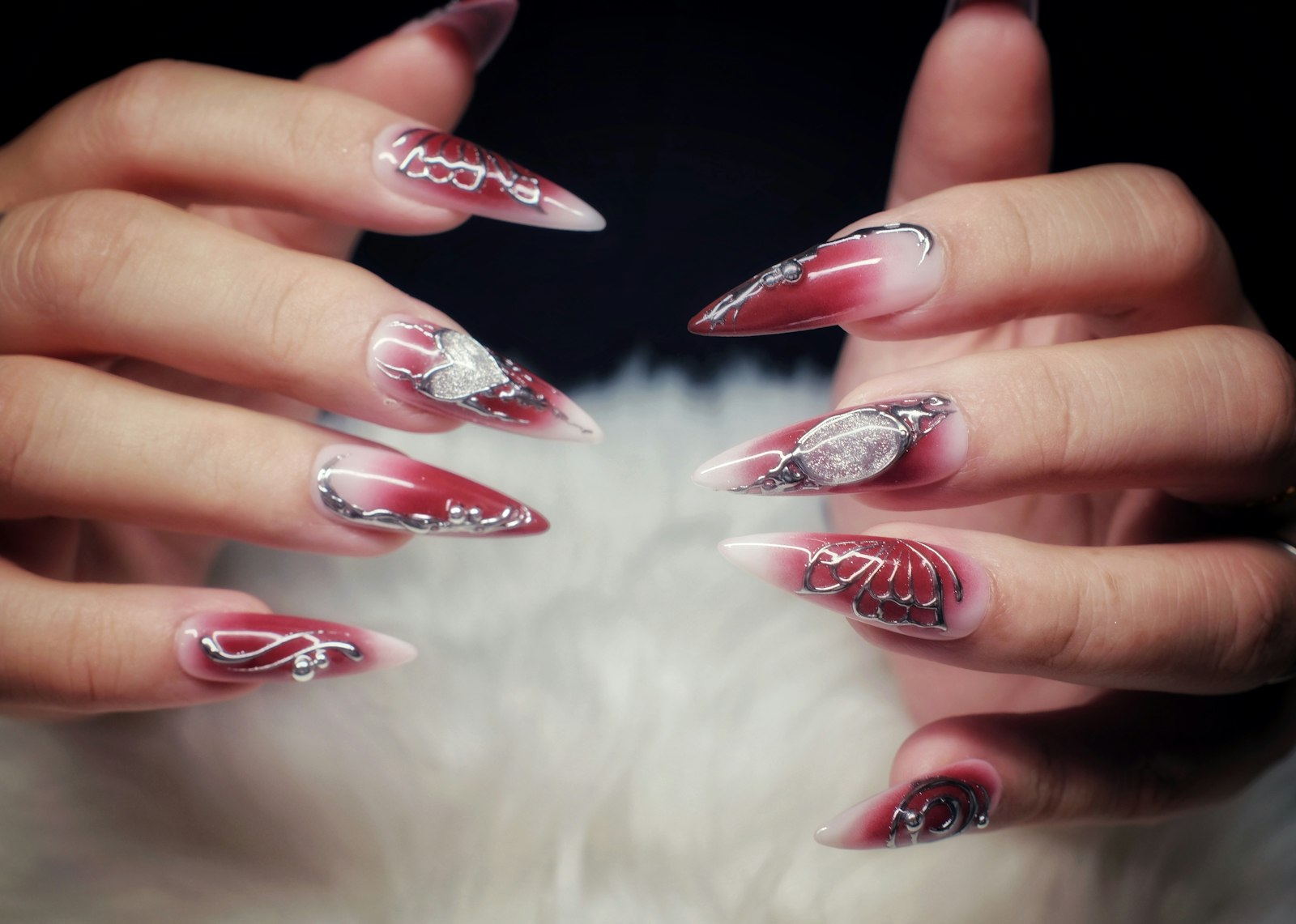 Stock photo: long acrylic stiletto nails (not a photo of Kim's Nail & Spa)